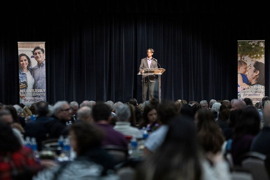Michael Iglio stands before 600 guests